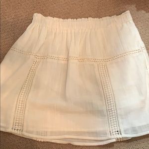 White/ cream mini skirt with elastic waist